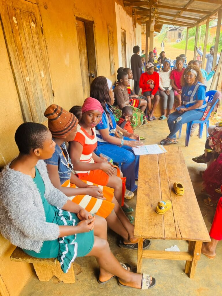 Young people sharing their concerns during a needs assessment discussion in Njong Village