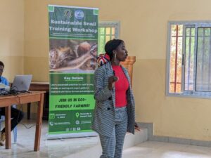 Trainer presenting at the snail training workshop